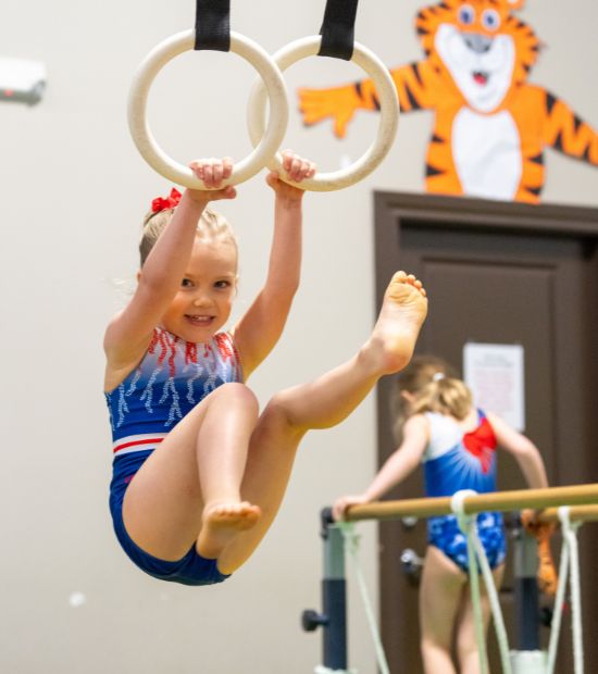 TEK 2 yr girl ring leg lift (550x620)